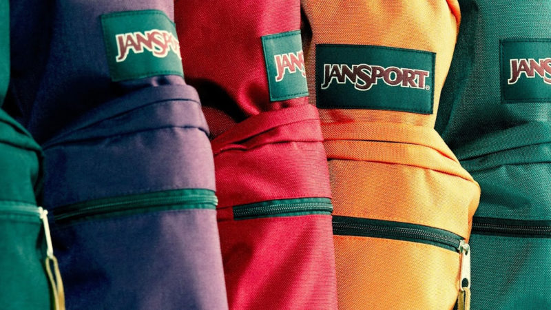 Different colored Jansport backpacks