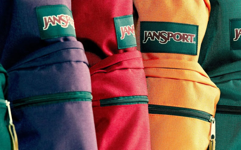 Different colored Jansport backpacks